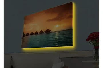 Lærredsbillede med LED-belysning - Solnedgang over en tropisk strand med bungalows over vandet - Orange / Turkis - Boligtilbehør - Billeder & kunst - Billeder på lærred