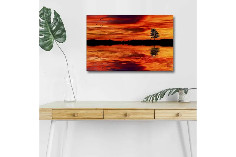 Lærredsbillede med LED-belysning - Solnedgang over roligt vand med silhuet af et ensomt træ, Orange / Rød / Sort