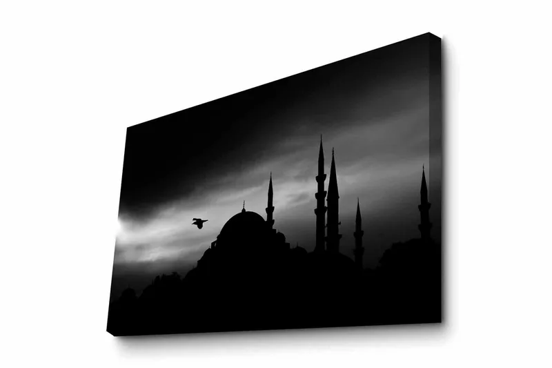 Lærredsbillede - Silhuet af en moské med spir i dramatisk himmel, Sort / Grå