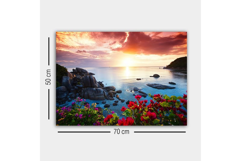 Lærredsbillede - Smuk solnedgang over havet med blomster i forgrunden - Lyserød / Blå / Orange - Boligtilbehør - Billeder & kunst - Billeder på lærred