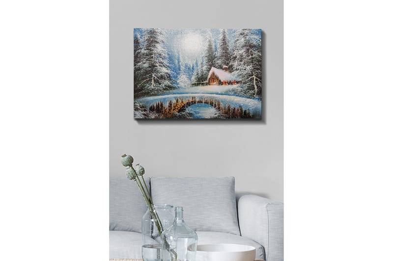 Lærredsbillede - Vinterlandskab med et sommerhus og snedækkede træer - Blå / Hvid / Brun - Boligtilbehør - Billeder & kunst - Billeder på lærred