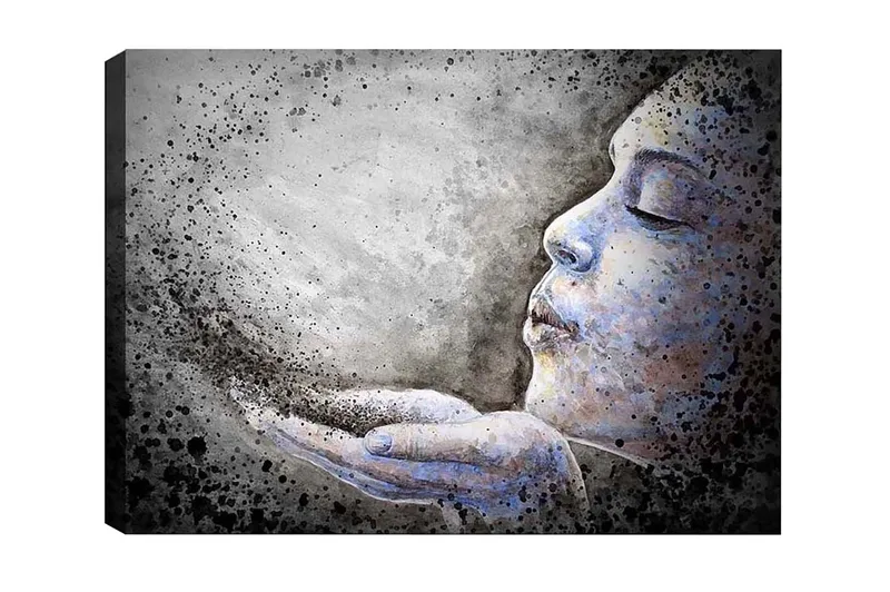 Lærredsbillede - Portræt af en kvinde, der blæser partikler ud af sine hænder, Grå / Blå / Sort