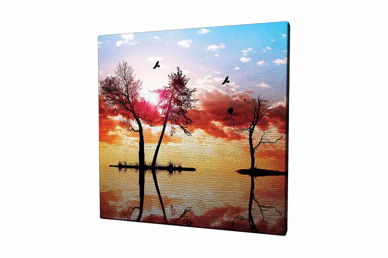 Lærredstryk 45x45 cm - Silhuetter af træer ved solnedgang med refleksioner i vandet, Orange / Pink / Blå