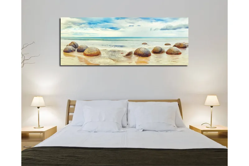 Lærredstryk 80x30 cm - Runde sten på en strand med hav og himmel i baggrunden - Blå / Beige / Grå - Boligtilbehør - Billeder & kunst - Billeder på lærred