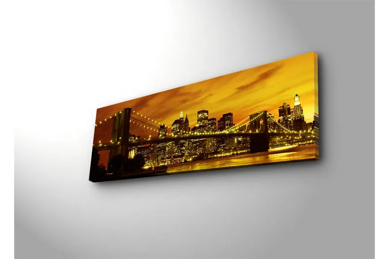 Lærredstryk med LED-belysning 30x90 cm - Bysilhuet med bro i solnedgangens gyldne lys - Guld / Sort / Orange - Boligtilbehør - Billeder & kunst - Billeder på lærred