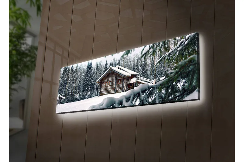 Lærredstryk med LED-belysning 30x90 cm - Vinterlandskab med et sommerhus omgivet af sne og grantræer, Hvid / Grøn / Brun