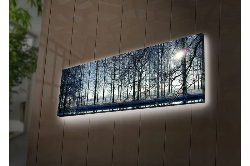 Lærredstryk med LED-belysning 30x90 cm - Vinterlandskab med snedækkede træer og en svag solstråle, Blå / Hvid / Grå