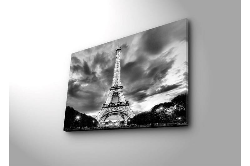 Lærredstryk med LED-belysning 45x70 cm - Dramatisk fotobillede af det oplyste Eiffeltårn i Paris med en overskyet himmel i sort-hvid - Sort / Hvid - Boligtilbehør - Billeder & kunst - Billeder på lærred