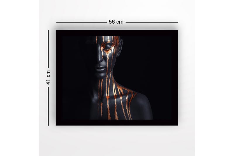 Indrammet lærred i træ - 41x56 cm - Mørk figur med guldstriber, der løber ned ad ansigt og krop - Sort / Guld - Boligtilbehør - Billeder & kunst