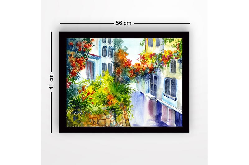 Indrammet lærredstryk i træ - 41x56 cm - Farverig gade med blomstrende planter og husfacader - Grøn / Rød / Gul - Boligtilbehør - Billeder & kunst