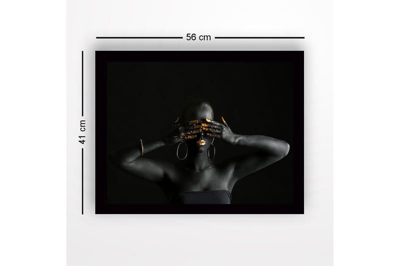 Indrammet lærredstryk i træ - 41x56 cm - Mørk figur med gyldne detaljer, der dækker ansigt og hænder - Sort / Guld - Boligtilbehør - Billeder & kunst