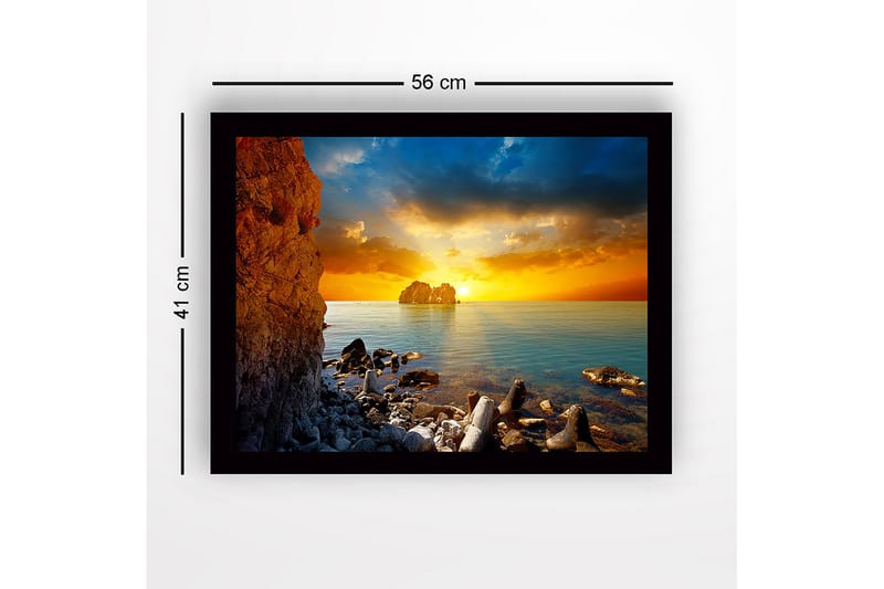 Indrammet lærredstryk i træ - 41x56 cm - Solnedgang over havet med klippeformationer i forgrunden - Orange / Blå / Grå - Boligtilbehør - Billeder & kunst