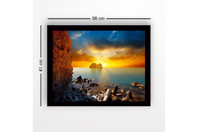 Indrammet lærredstryk i træ - 41x56 cm - Solnedgang over havet med klippeformationer i forgrunden - Orange / Blå / Grå - Boligtilbehør - Billeder & kunst